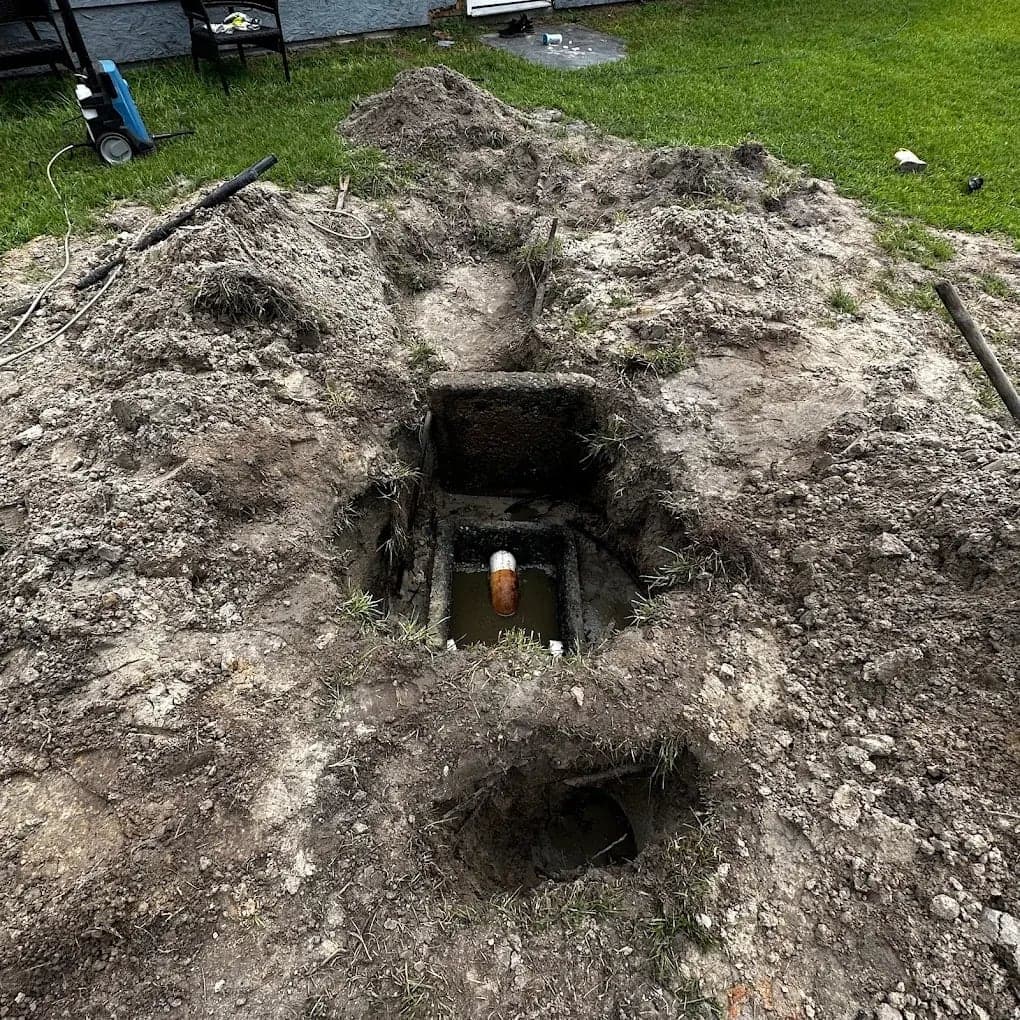 Digging down to a failed tank and outlet line
